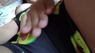 The cute porn actress YuliethGomez in a swimsuit while touching her wet cunt