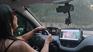 Driving while watching porn.